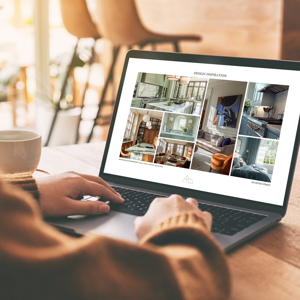 A person sitting at a table with a laptop displaying a presentation template with multiple inspiration images of interior designs. From the LSI Workshop Alex collection.