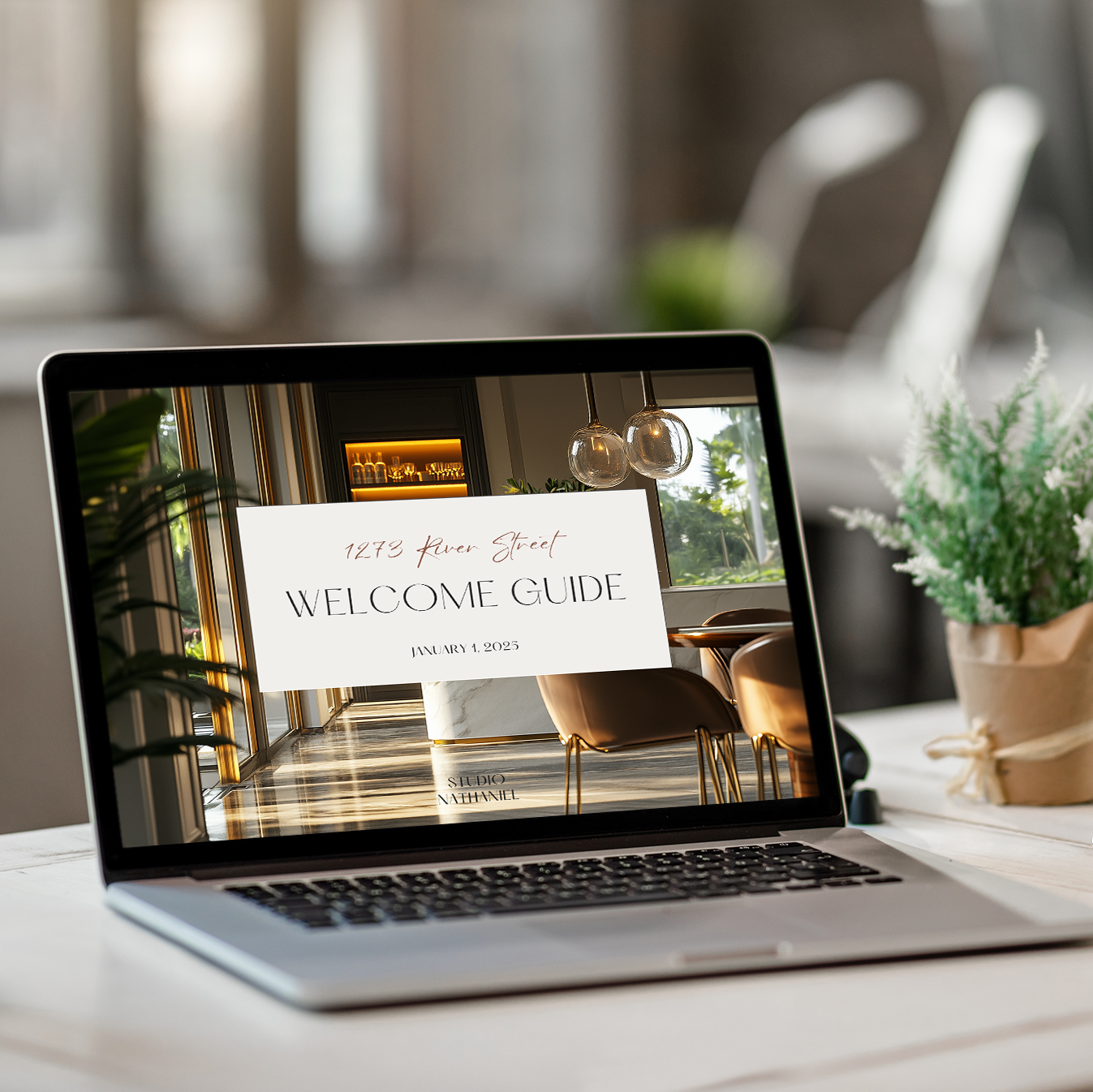 Laptop displaying the New Client Welcome Guide template for construction projects from LSI Workshop, the Nathaniel Collection.
